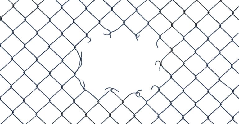 Hole In A Chain-Link Fence